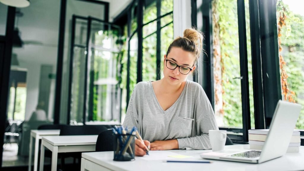 Student working on college essay