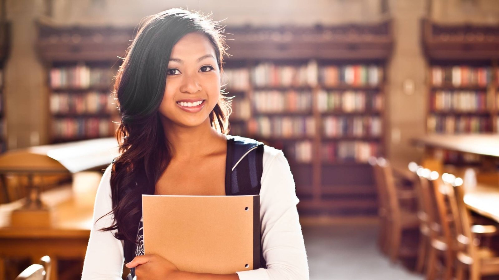 teenager with books