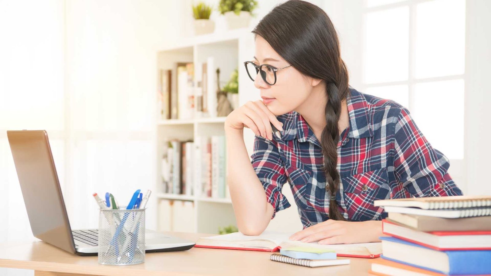 student with computer