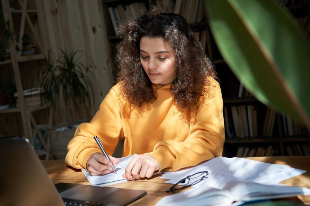 girl preparing for her essay