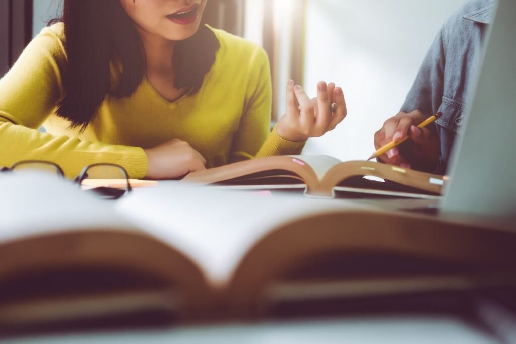 girl reading a book in the library