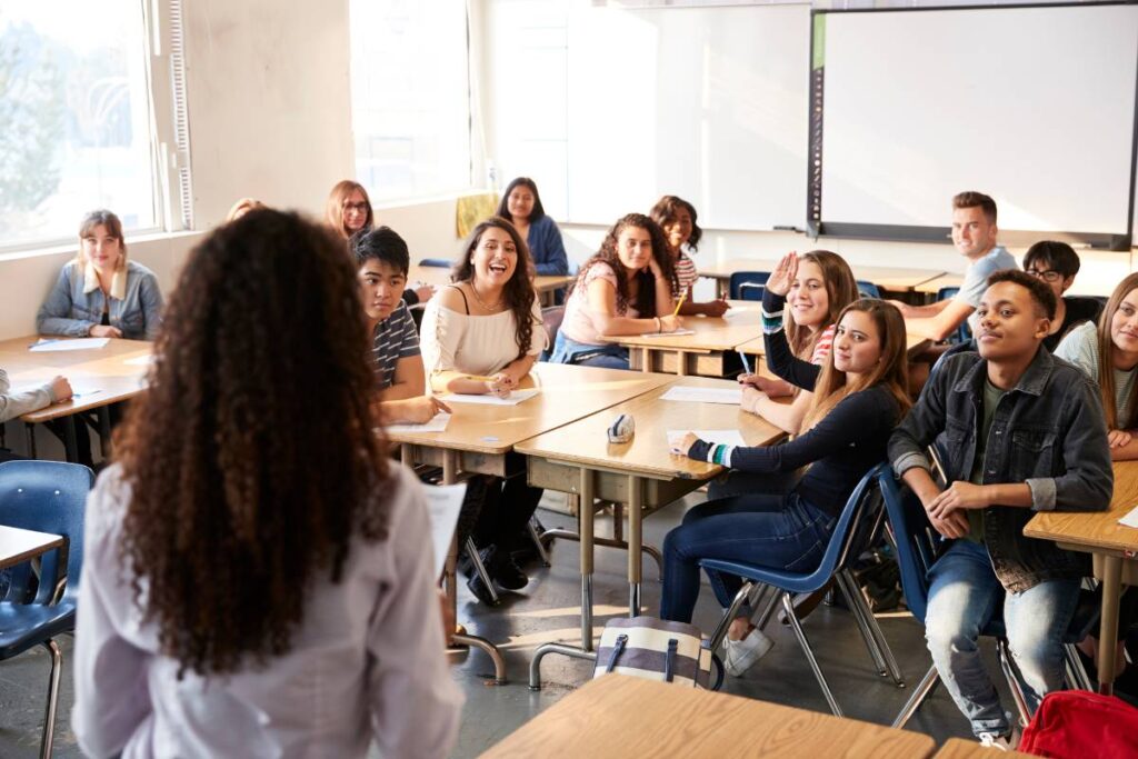 High School Teacher in Front of Class